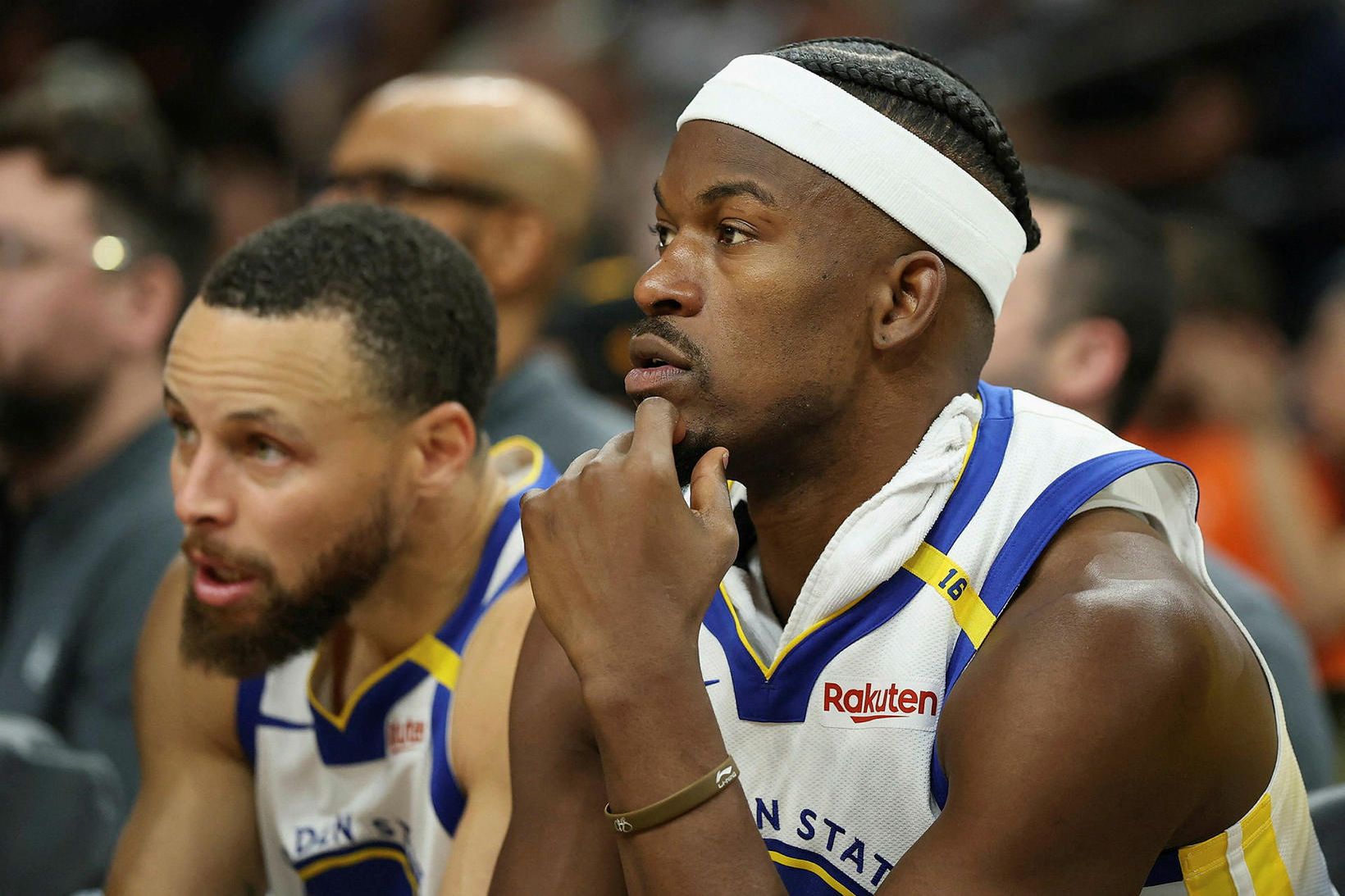 Steph Curry, t.v., og Jimmy Butler.