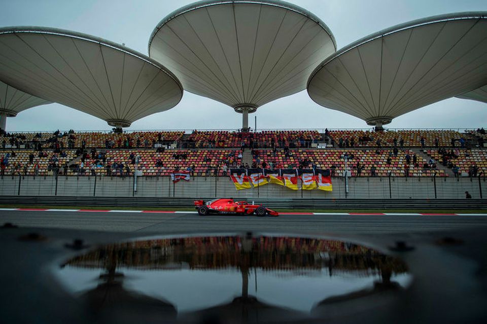 Sebastian Vettel í tímatökunni í Sjanghæ.