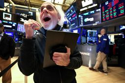 Menn voru hæstánægðir á Wall Street.