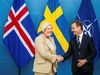 Halla Tómasdóttir and Ulf Kristersson shake hands at the start of the meeting.