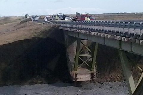 The bridge's support structure exposed.