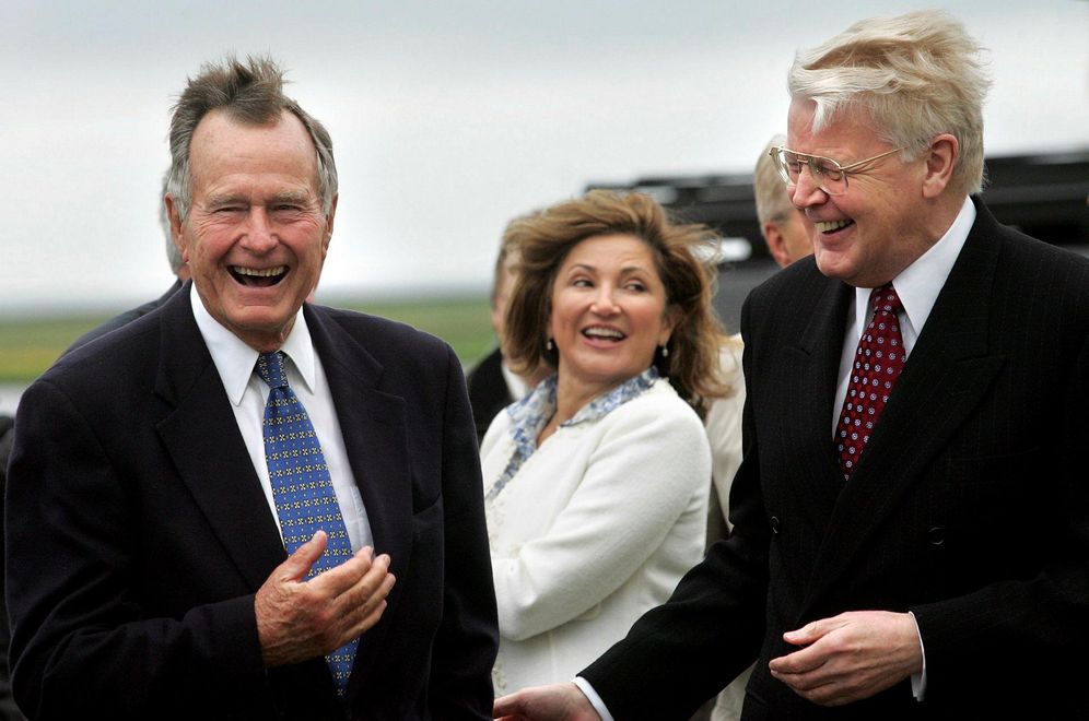 The presidential couple with US President George Bush.