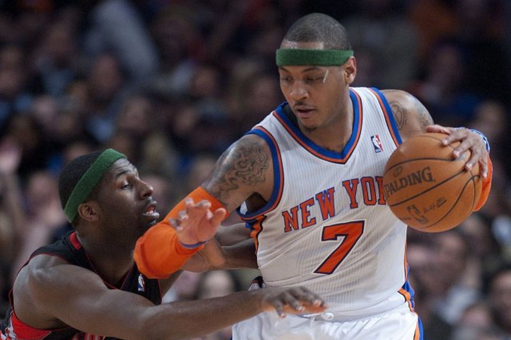 Carmelo Anthony hjá New York sækir en Julian Wright hjá …