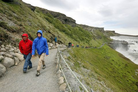 Hundreds of tourists visit Gullfoss, Iceland's most famous waterfall, every day.