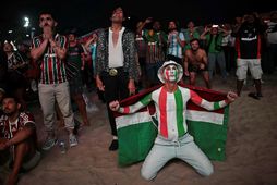 Stuðningsmenn Fluminense fjölmenntu á Copacabana-ströndina í Rio de Janeiro til að fylgjast með leik sinna …