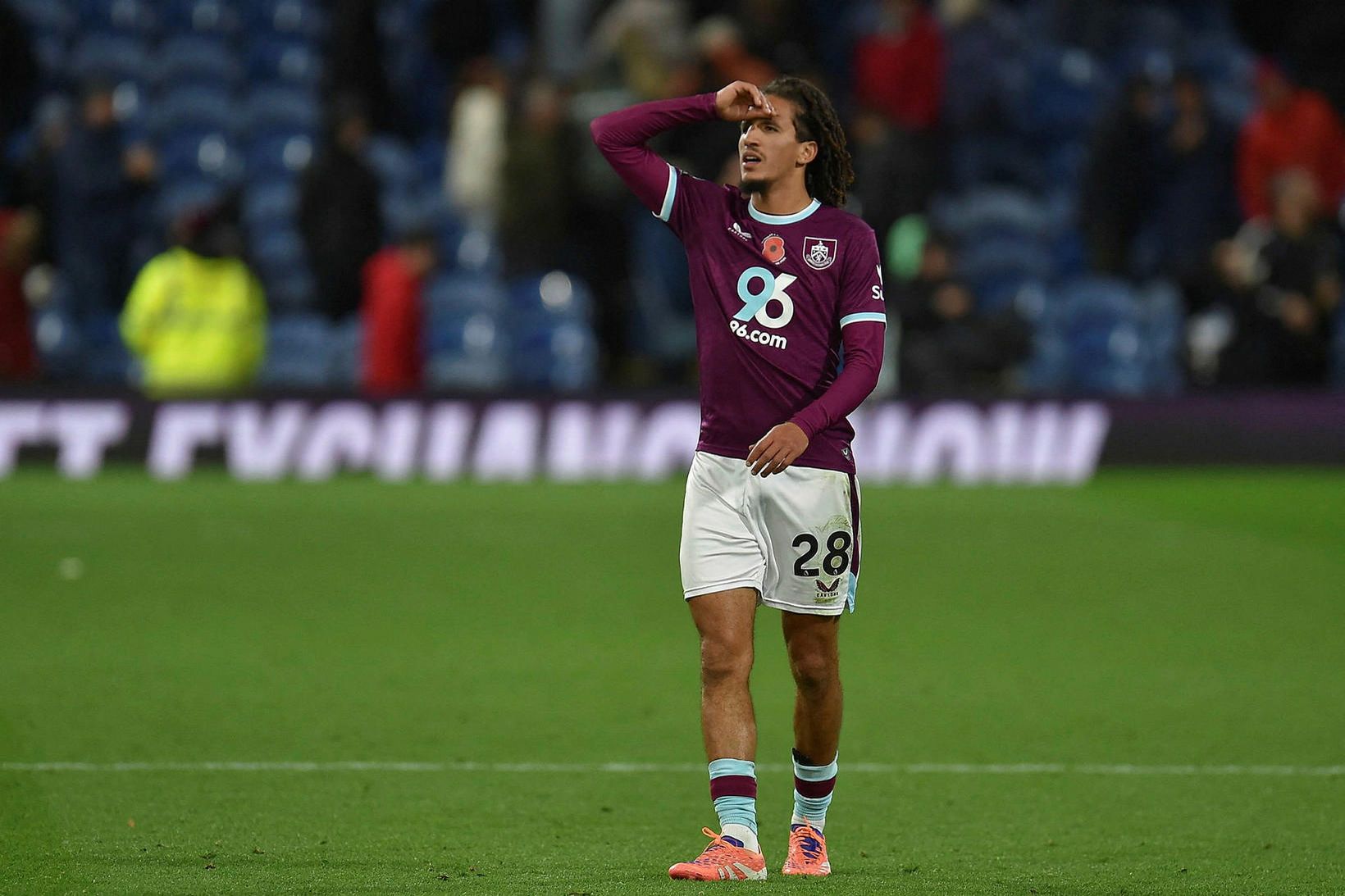 Kærður fyrir að hrækja á stuðningsmenn