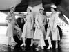 Flight attendants Ester Magnúsdóttir, Salvör Þormóðsdóttir, Erna Hrólfsdóttir and Suzette Reding Carlén show off the latest flight attendant fashion. The clothing was introduced on April 1, 1971 and designed by master tailor Jón Skúli Þórisson.