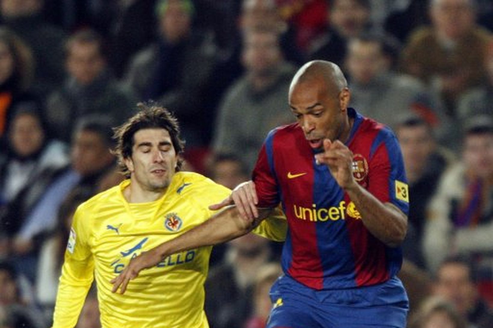 Thierry Henry í leik með Barcelona.