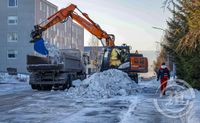 Bílastæði og gangstéttar mokaðar í Vesturbæ