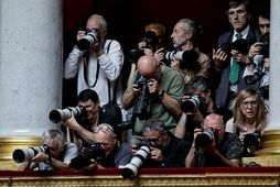 Ljósmyndarar að störfum á franska þinginu. Michael Francello segir myndir sem skapaðar eru með gervigreind …