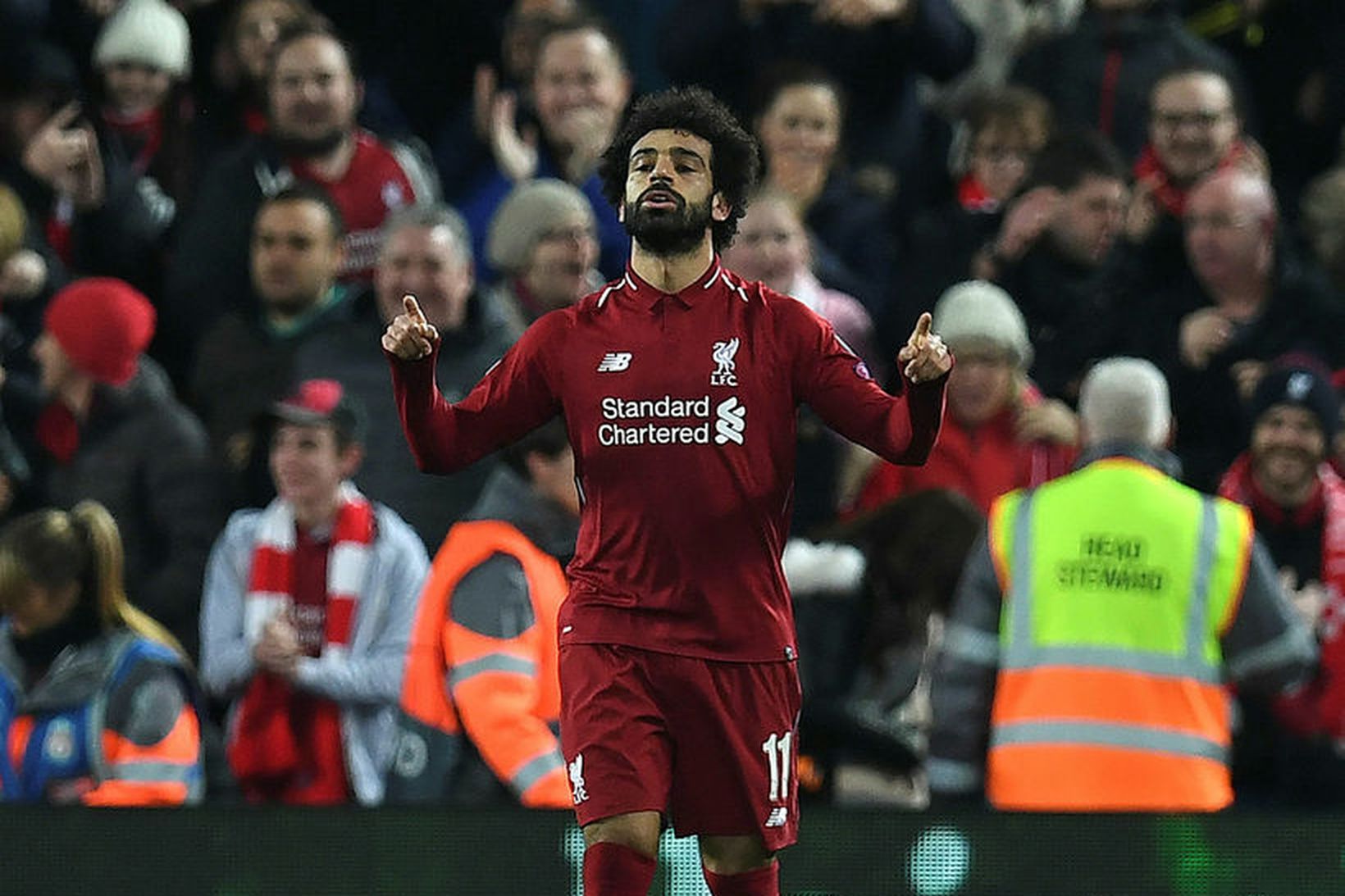 Mohamed Salah fagnar marki sínu á Anfield í kvöld.