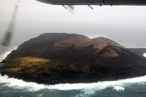 Surtsey island. The assistants will take pictures from the air.