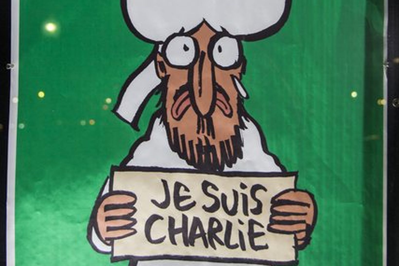 Forsíða Charlie Hebdo eftir árásina á ritstjórnarskrifstofur skopmyndablaðsins.