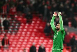 Gianluigi Donnarumma fagnar eftir að hafa verið hetjan í vítaspyrnukeppninni á Anfield.