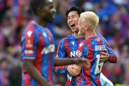 Daichi Kamada og Will Hughes fagna í leikslok.