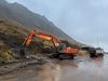 Clearing up the Hnífsdalsvegur Road yesterday.