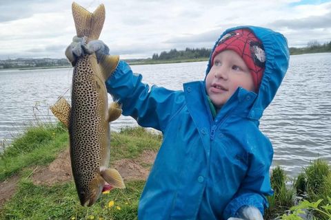 Egill Óli with this good looking trout from Elliavatn lake. He is wearing his superhero custome underneath his fishing outfit, because you never know...