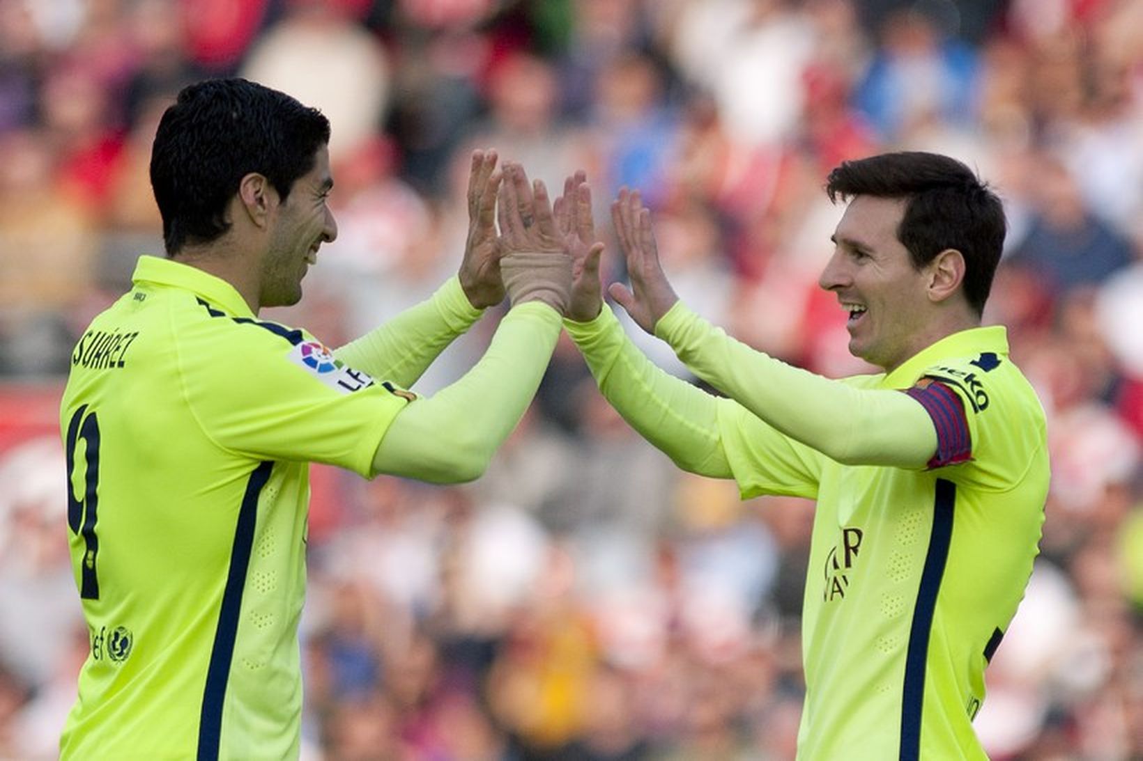 Lionel Messi og Luis Suárez fagna í dag en þeir …
