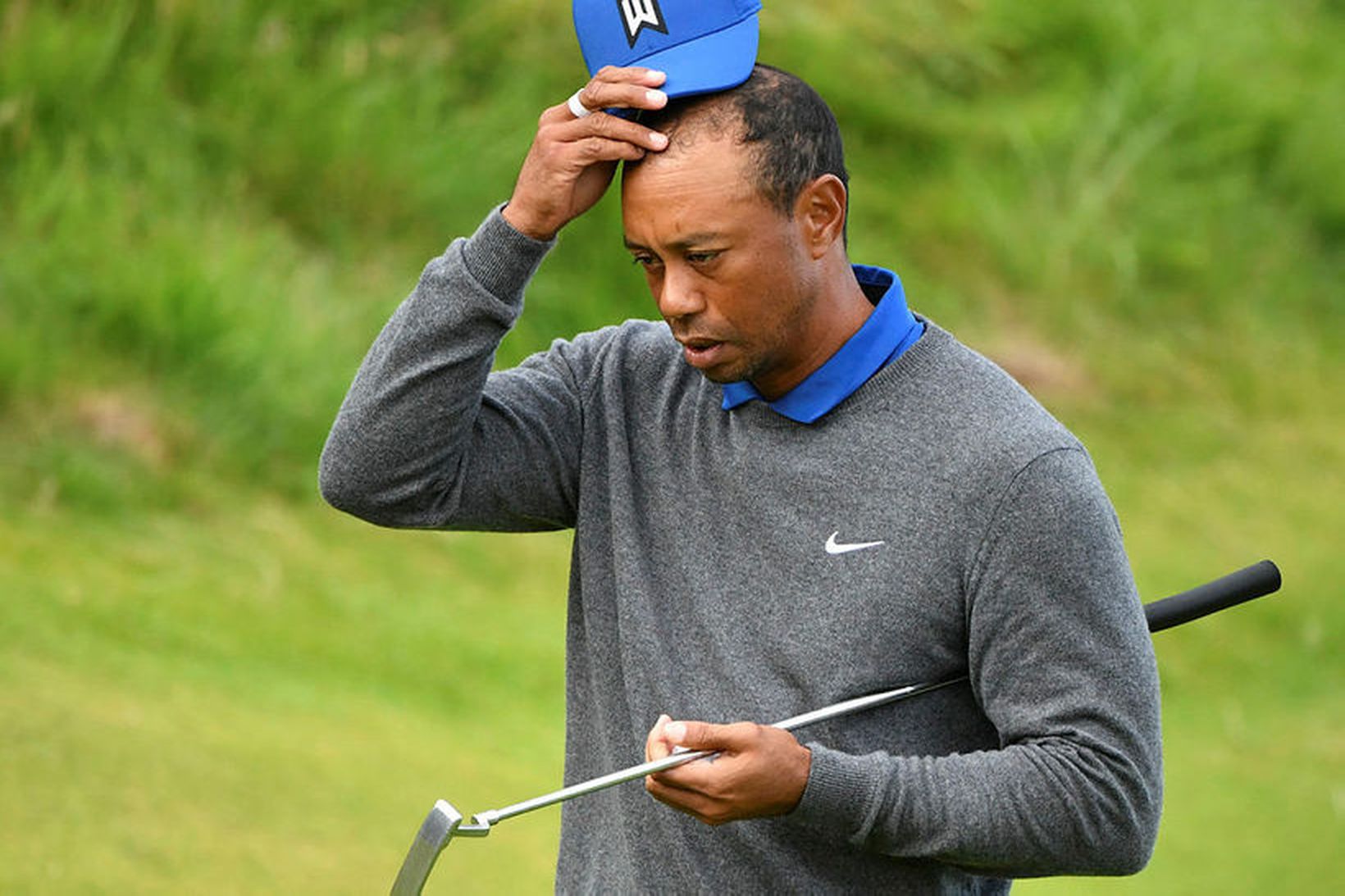 Tiger Woods var ekki skemmt að lokinni átjándu holunni í …
