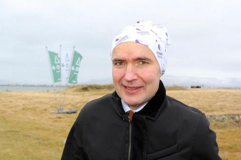Guðni Th. Jóhannesson, President of Iceland wearing Buff headwear in the wind and rain yesterday.