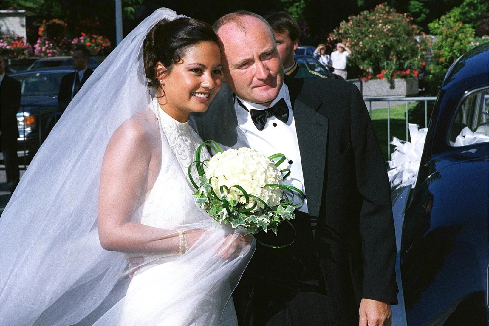 Orianne Cevey og Phill Collins á brúðkaupsdaginn sinn árið 1999.
