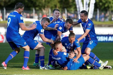 The team celebrating the winning goal