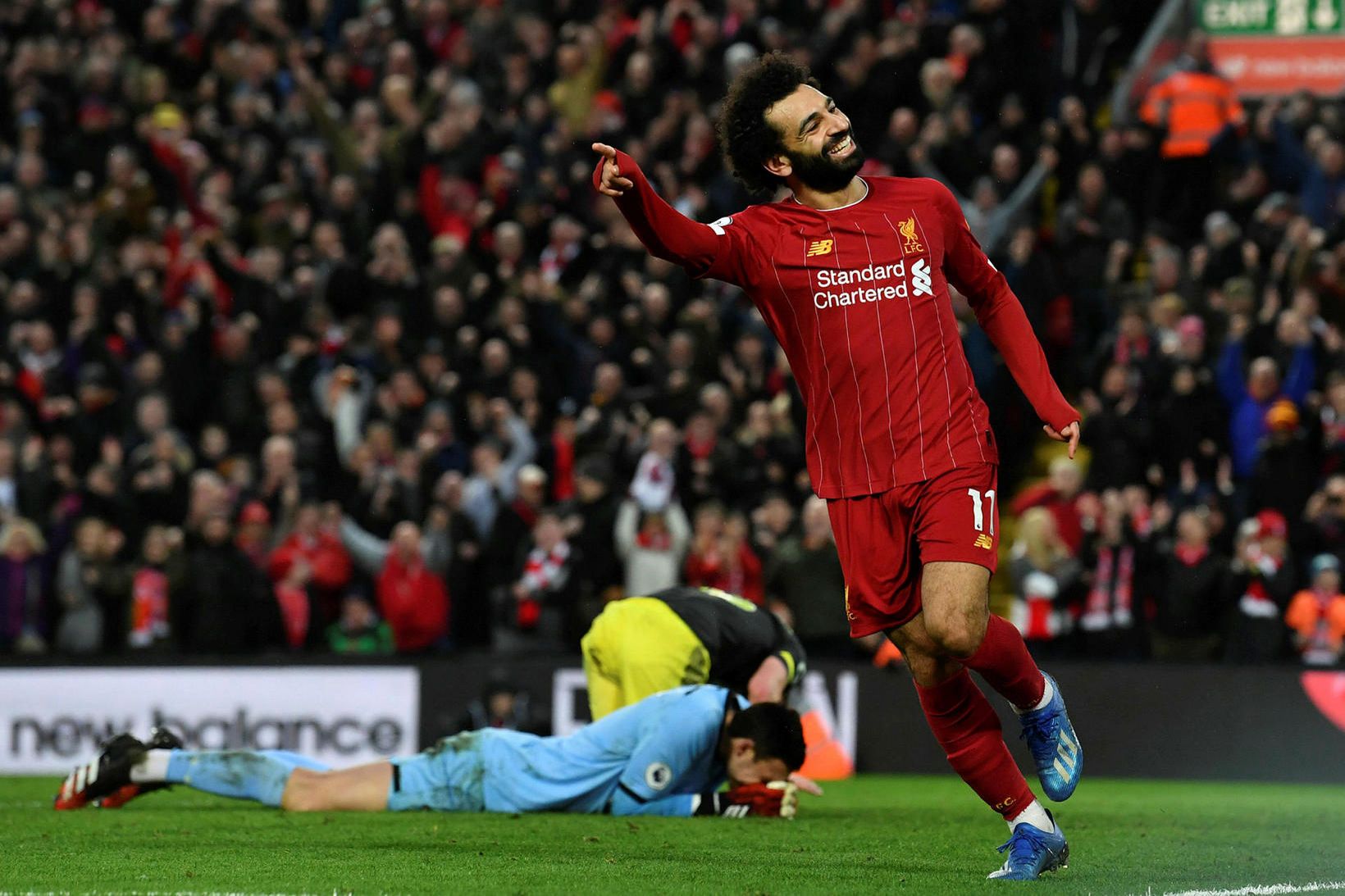 Mohamed Salah fagnar fjórða marki Liverpool og sínu öðru marki.