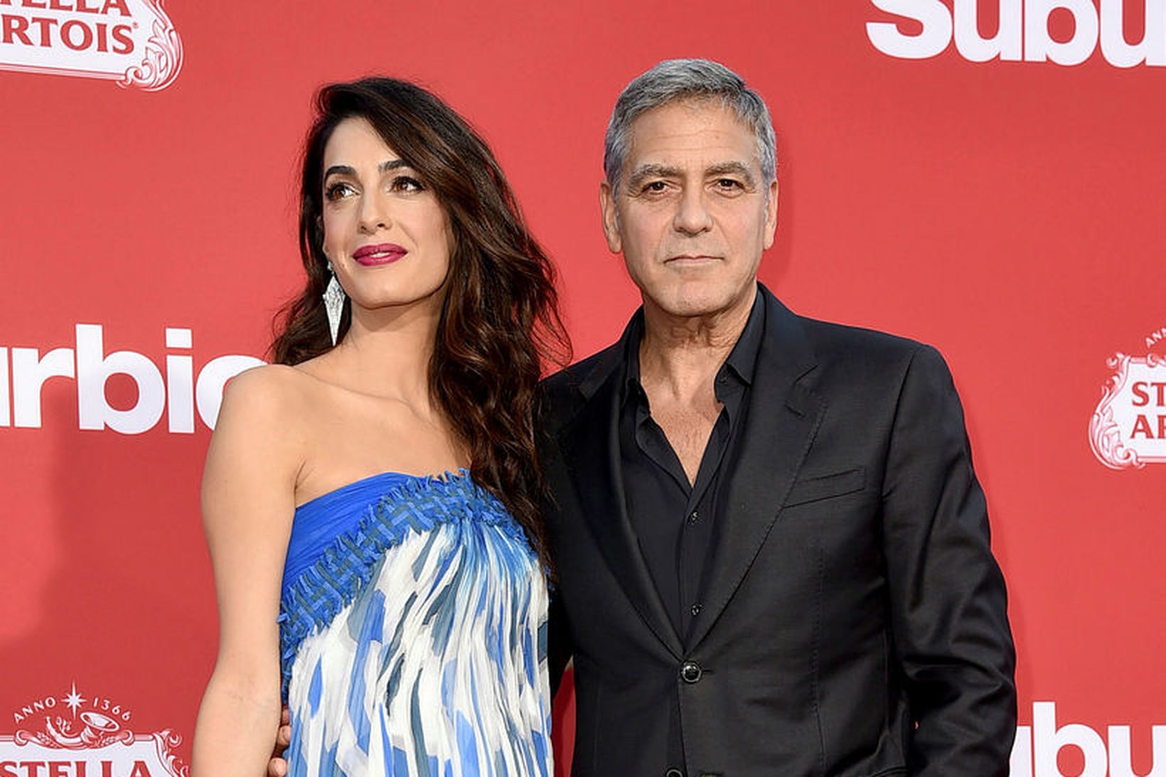 George Clooney og eiginkona hans Amal Clooney.