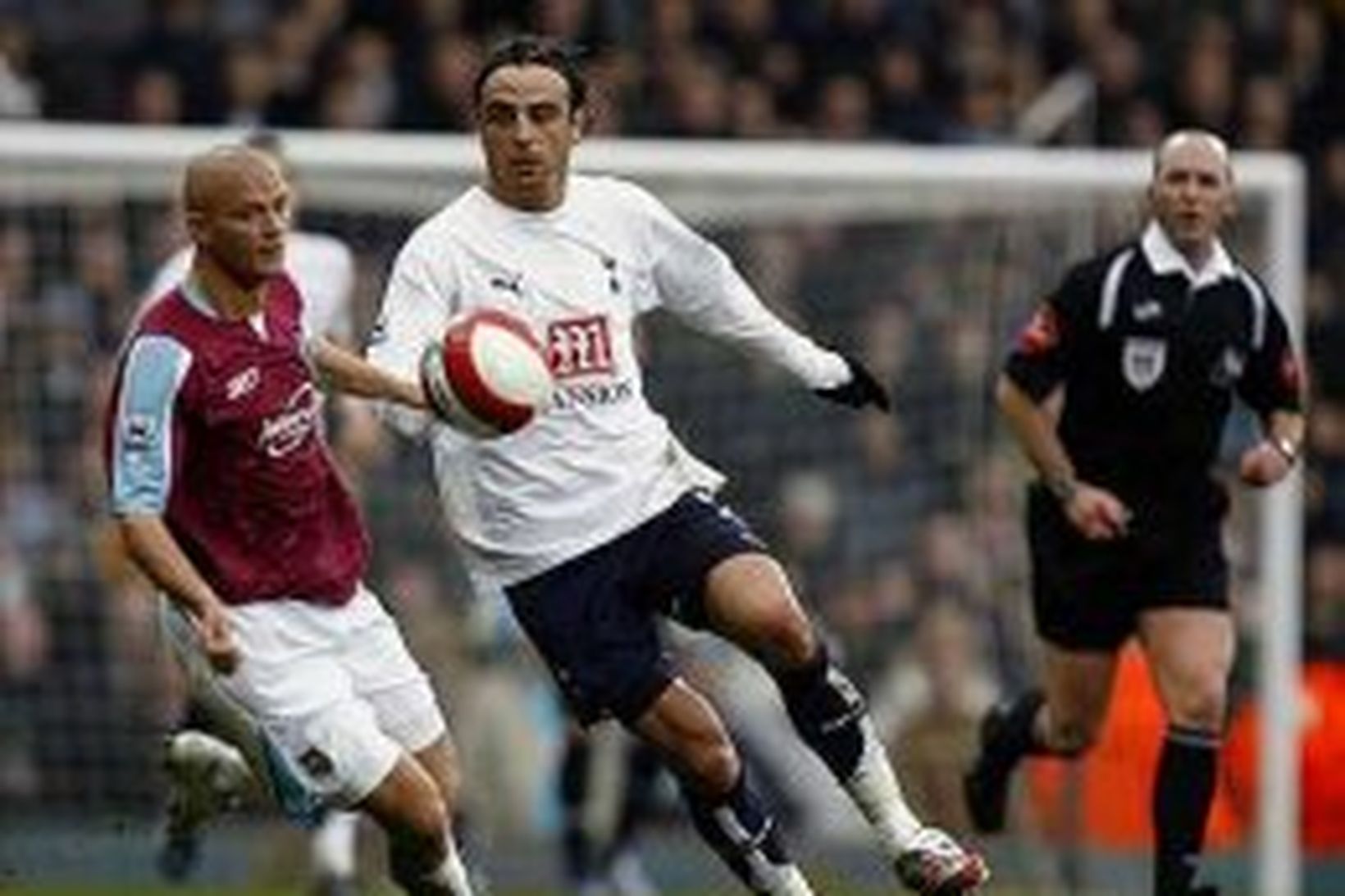 Paul Konchesky og Dimitar Berbatov í baráttunni á Upton Park …