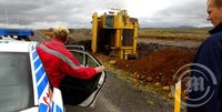 Trukkur veltur á Reykjanesbraut