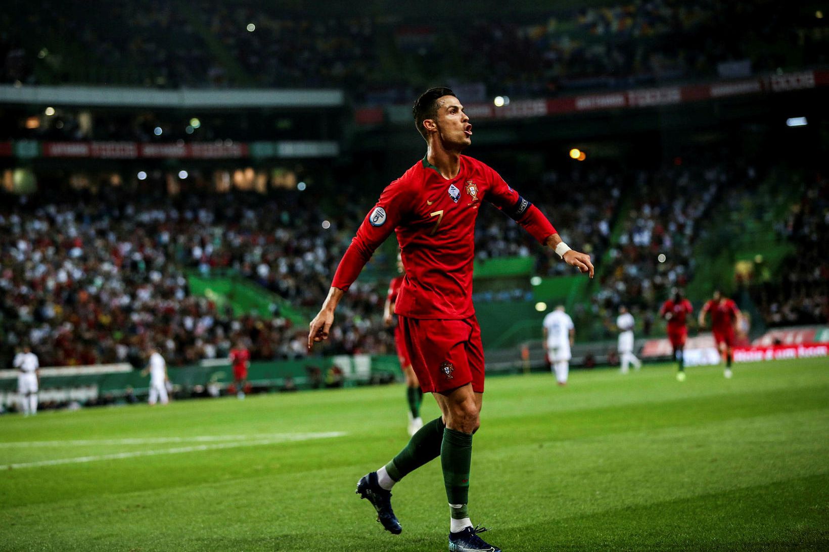 Cristiano Ronaldo fagnar marki sínu í leiknum í Lissabon í …