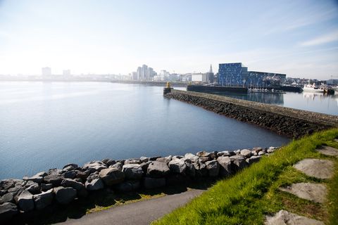 Fog over the ocean this morning. The photo is taken at Sæbraut in central Reykjavik with Harpa concert hall gleaming in the distance.