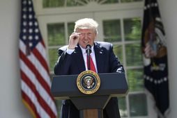 Donald Trump Bandaríkjaforseti tilkynnir um ákvörðun sína í gær.