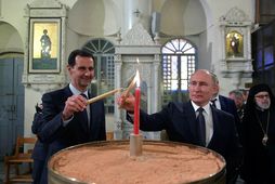 Bandamennirnir Bashar al-Assad og Vla­dimír Pútín.