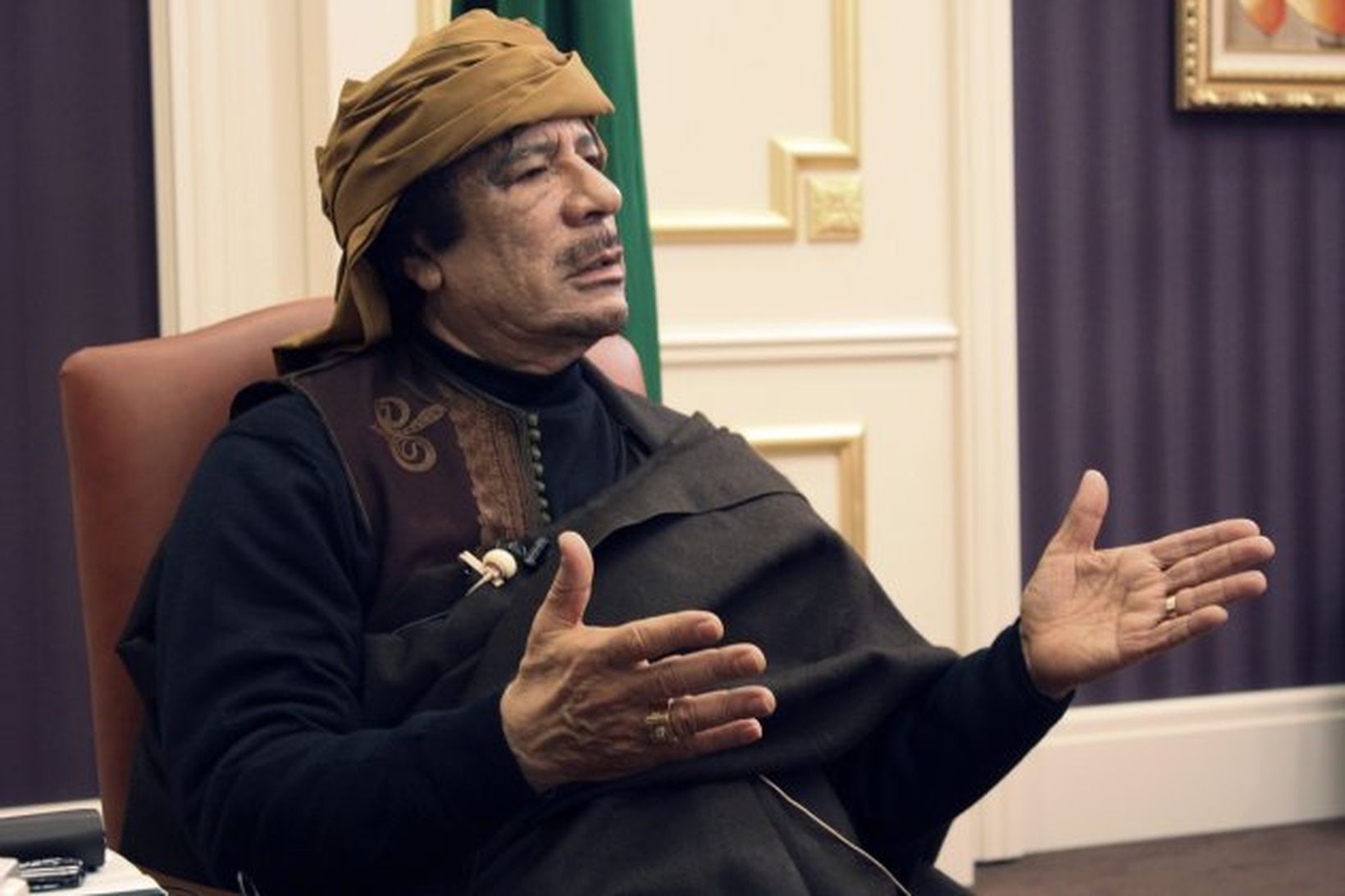 Múammar Gaddafi.