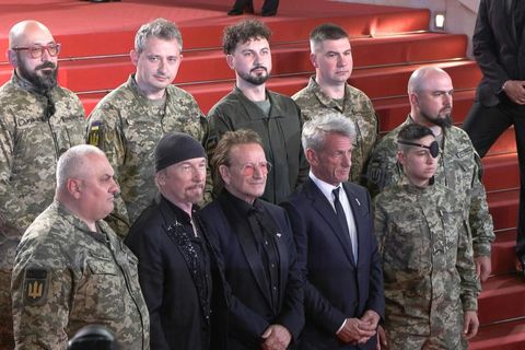 Bono brings Ukrainian soldiers onto red carpet at Cannes Film Festival