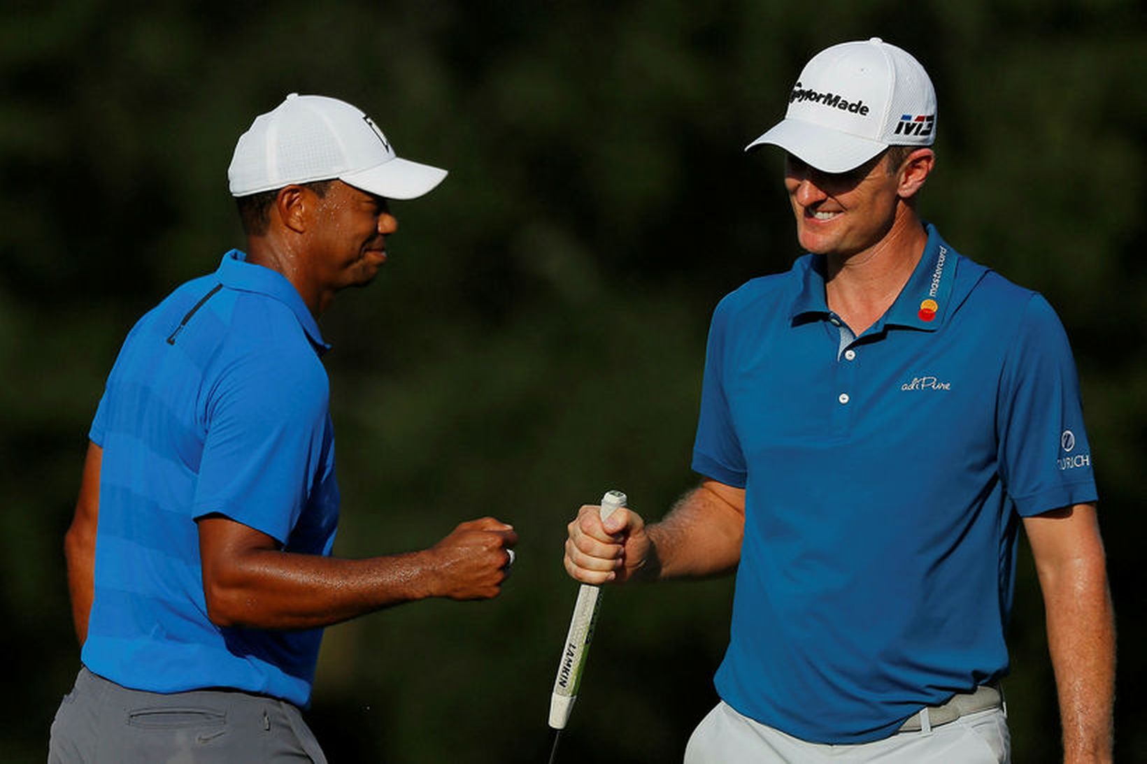 Tiger Woods og Justin Rose í gírnum á hringnum í …