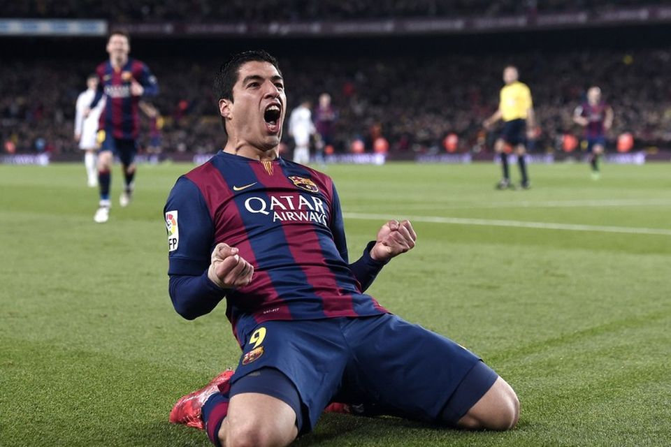 Luis Suárez fagnar af innlifun, en mark hans réði úrslitum í kvöld.