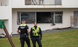 Einn lést í eldsvoðanum en annar er alvarlega slasaður.