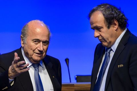 Michel Platini (t.h.) ásamt Sepp Blatter, fráfarandi forseta FIFA, en þeir hafa þurft að vinna …