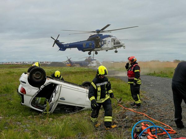 Emergency response exercise involving Coast Guard helicopters.