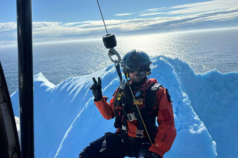 Photos: 75-meter-high iceberg towers over Coast Guard crew