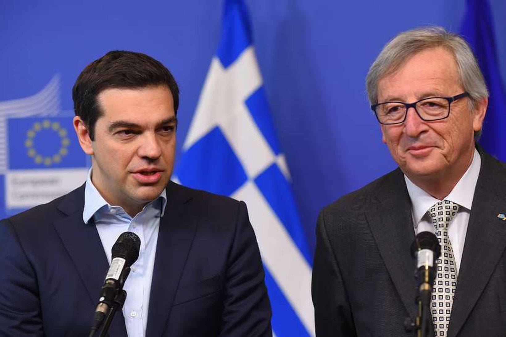 Alexis Tsipras og Jean-Claude Juncker ræddu við blaðamenn áður en …
