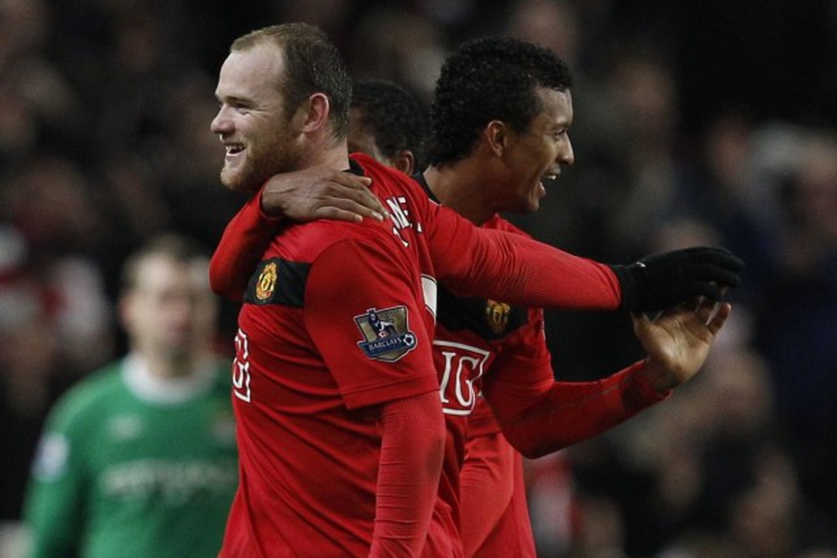 Wayne Rooney og Nani fagna í leikslok.