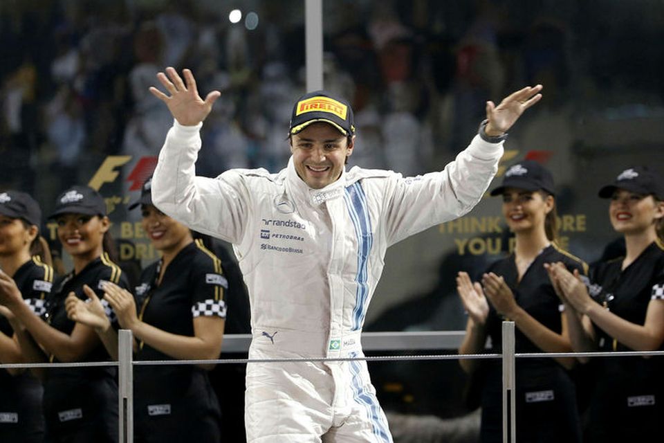 Felipe Massa fagnar pallsæti sem ökumaður Williams í Abu Dhabi 2014.