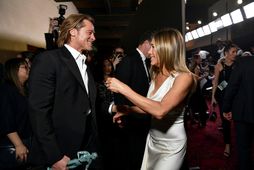 Brad Pitt og Jennifer Aniston voru innileg á Screen Actors Guild-verðlaunahátíðinni í janúar.