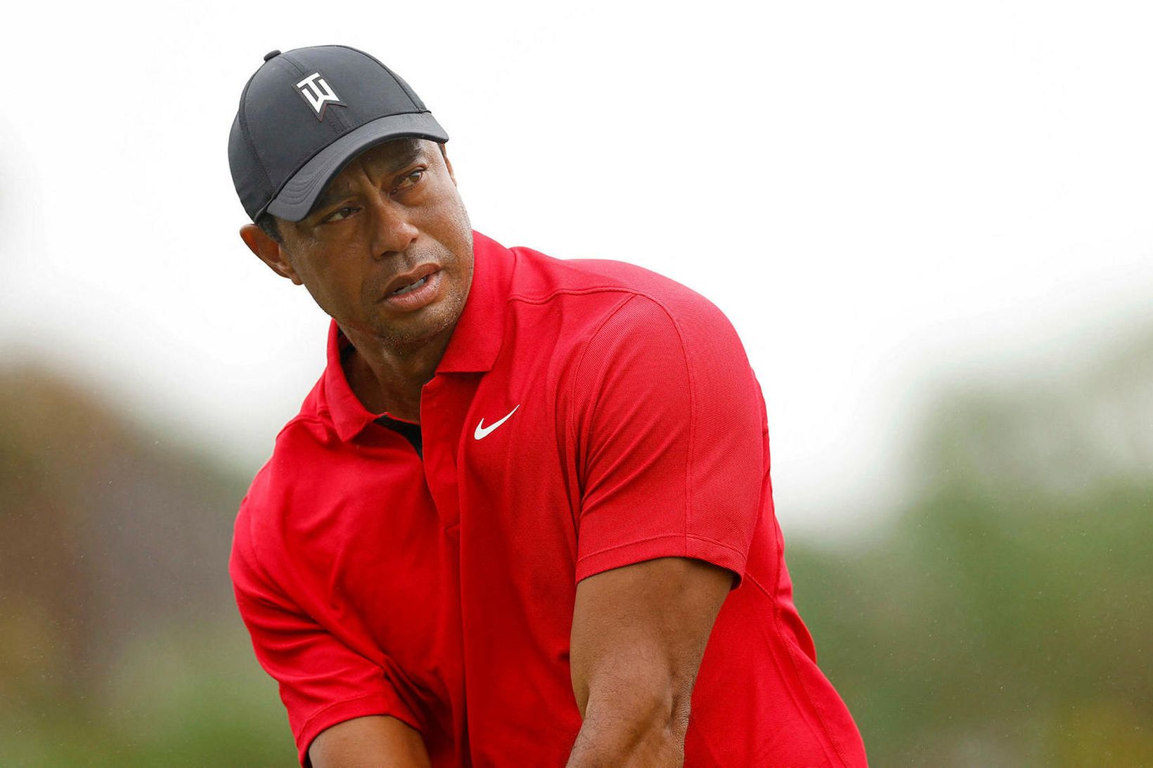 Tiger Woods spilaði oftast í rauðu þegar hann var upp …