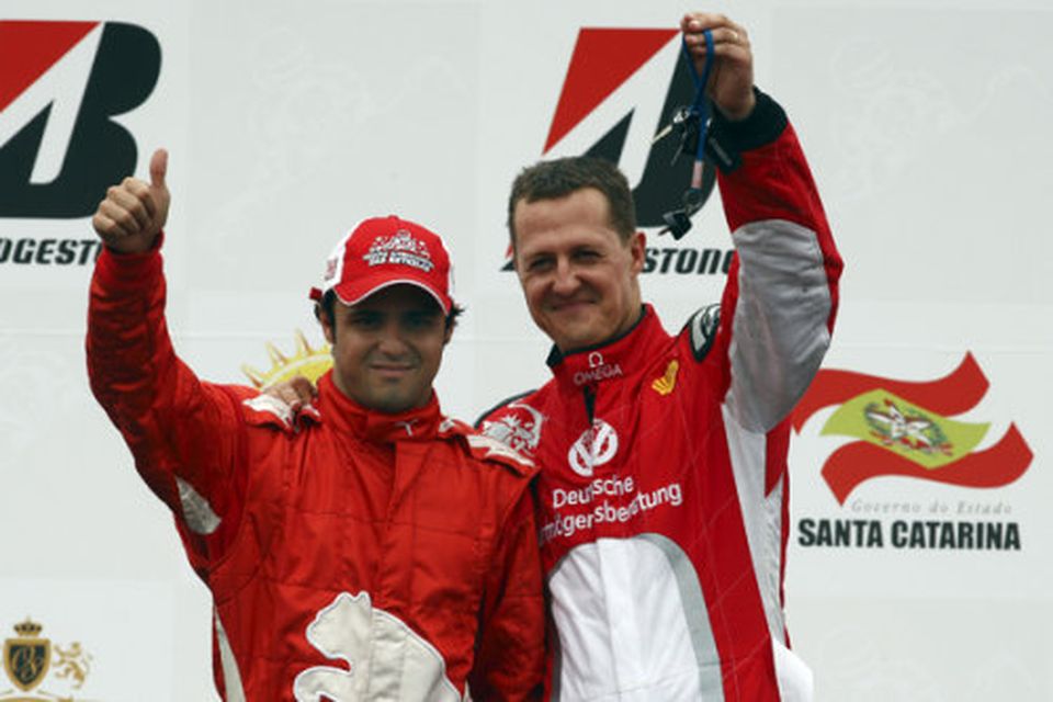 Michael Schumacher og Felipe Massa ánægðir í mótslok.