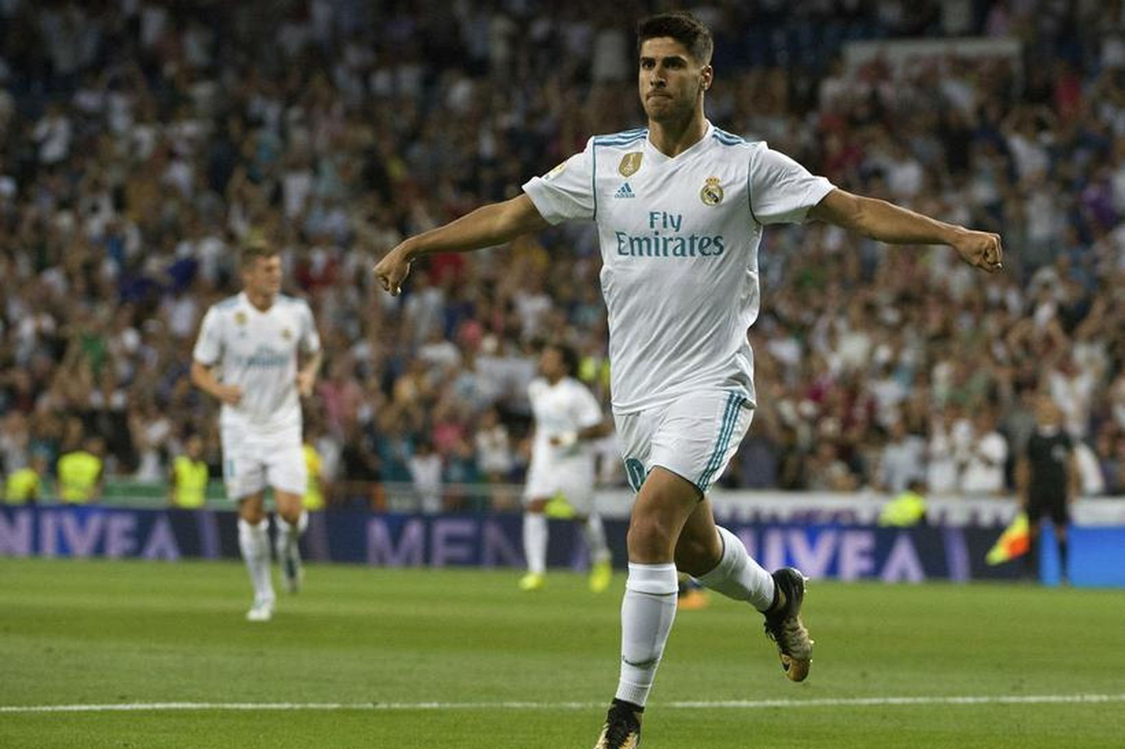 Marco Asensio fagnar marki með Real Madrid.