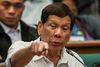 Duterte handtekinn fyrir glæpi gegn mannkyni